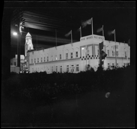 Palmerston North Post Office, with five flags flying - Resource cover image