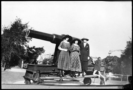 Women Pose on one of the Square Cannons