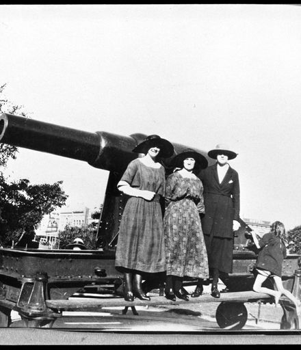 Women Pose on one of the Square Cannons