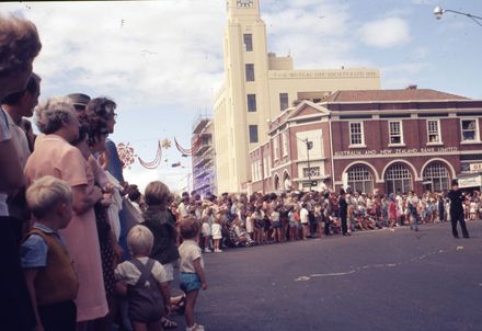 Crowds watch the Centennial Parade