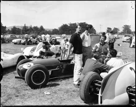 "Drivers Relax and Confer Before Levin Races" - Resource cover image