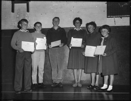 "Championship Winners Receive Their Certificates" Y.M.C.A. Swimming and Life-Saving Club - Resource cover image