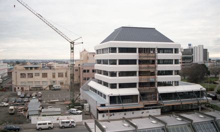 Construction of multi-storey building, corner of Main Street West and The Square