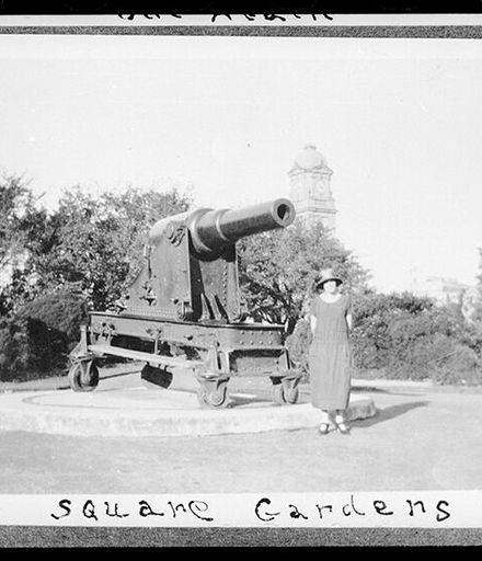 Woman standing beside a cannon in The Square