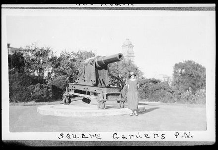 Woman standing beside a cannon in The Square