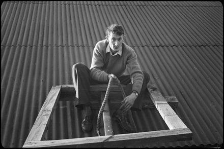 Frank Goldingham scales a roof