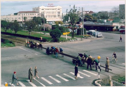 Workmen Removing Train Tracks from the Square
