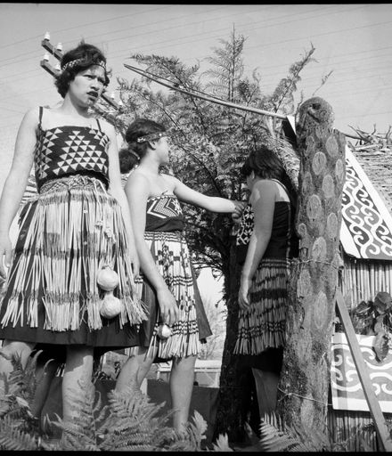Bainesse 50th Jubilee on bed" [Three young women in Kapa Haka uniforms]