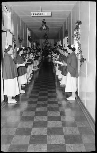 "Christmas Cheer" Nurses at Palmerston North Hospital on Christmas Eve