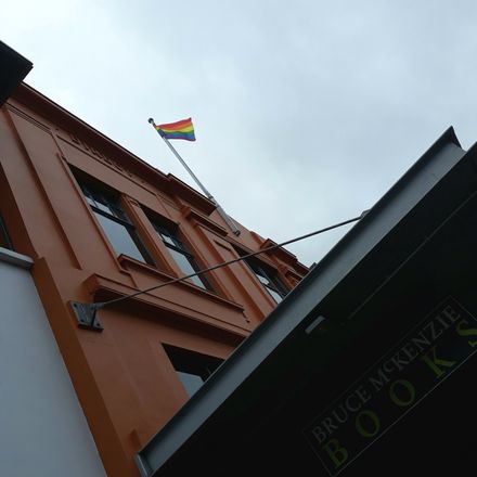 Rainbow flag atop Palmerston North City Library