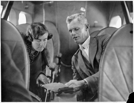 Laura Stannard and Ernest V. "Pop" West inside a Union Airways DH86