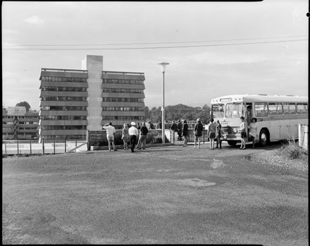 Passengers disembarking form a bus, Massey University
