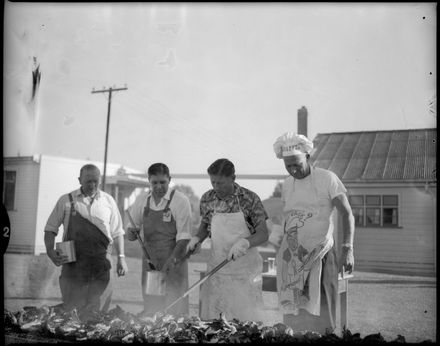 "The "Chief Frier" superintends operations" - Massey College Barbeque