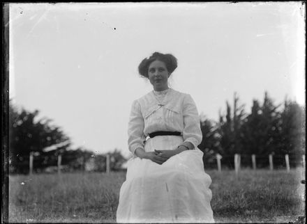 Woman Seated in Field