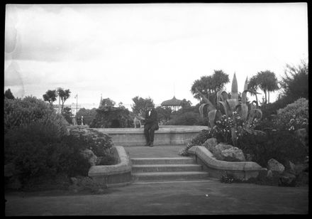 Man and Dog Next to Fountain, The Square