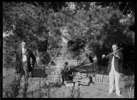 Men Stand beside Cylinder Phonograph Collection