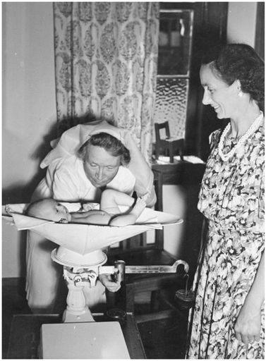 Evans Family Collection: Mrs Evans and baby at the Palmerston North Plunket Rooms