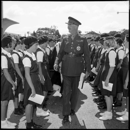 "Sir Bernard Walking Toward School Children"