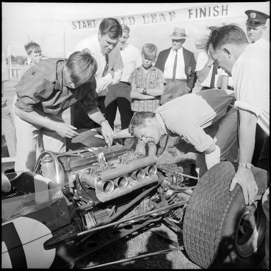 Inspecting Engine on Jim Clarks car