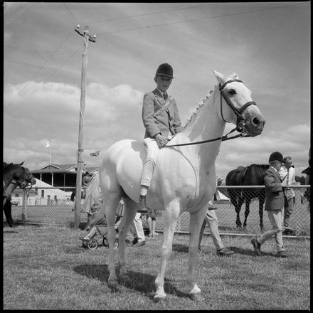 "Wins Prize for Bare-Back Riding"