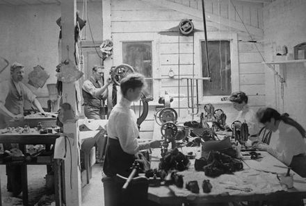 Staff in workroom of Johansen and Company, bootmakers