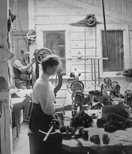 Staff in workroom of Johansen and Company, bootmakers