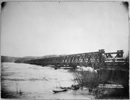 Fitzherbert Bridge under flood