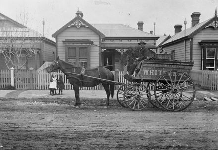 Mr W J Foster driving a Whitehead's delivery cart