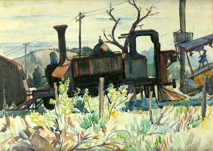 Discarded locomotive in disrepair, in long grass