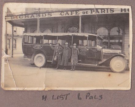 Bus parked in front of Cafe de Paris