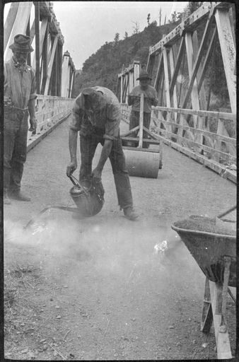 Workers Repairing Early Bridge