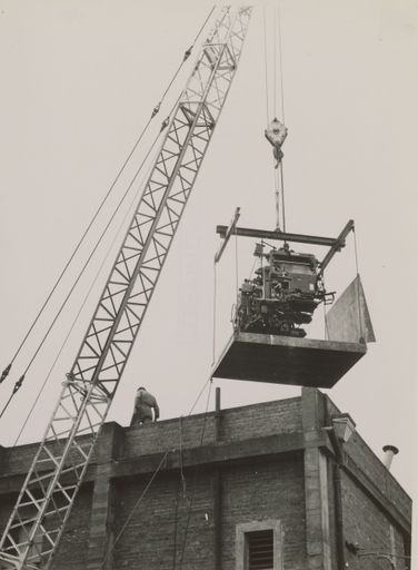 Installing machinery into the Manawatu Evening Standard building, The Square