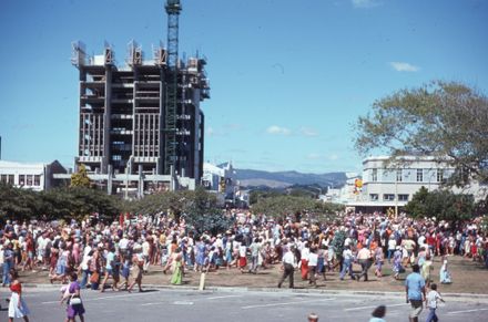 Crowds Gathering to Watch a Parade as it Enters in the Square