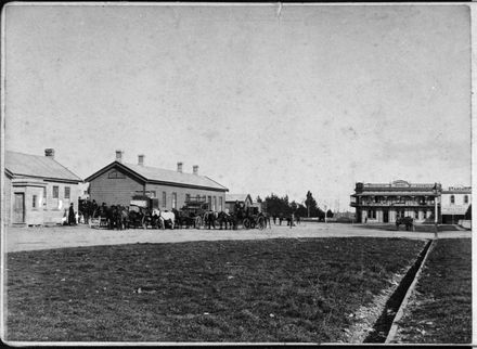 Horses and Carriages waiting outside Railway Station, The Square