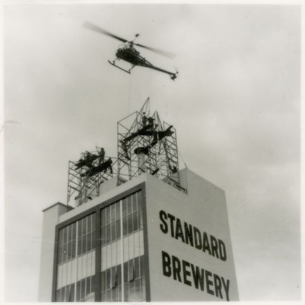 2021P_LionBreweries2-6-1_036068_008 - Helicopter Delivering Framing for Standard Brewery Sign