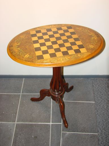 Oval wooden side table with inlaid chessboard pattern - Resource cover image