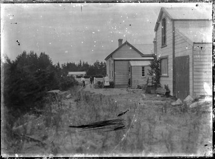 People Standing in Driveway, Unidentified Location - Resource cover image