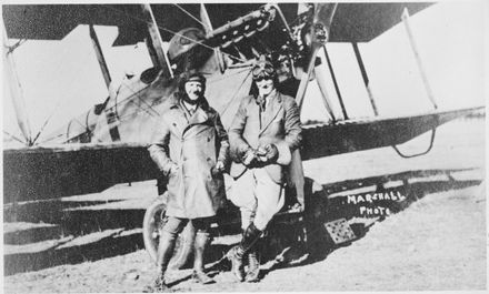 Captain Russell and H E Hibbard with Walsh Brothers DH6 aeroplane, Dannevirke