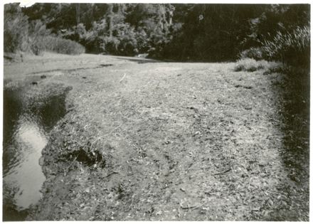 The old reservoir depleted of water and full of mud