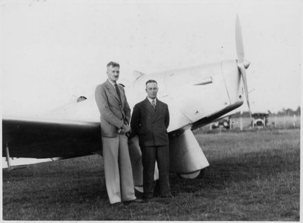 Squadron Leader M. C. McGregor and H. C. Walker with the Miles Hawk ZK-ADJ