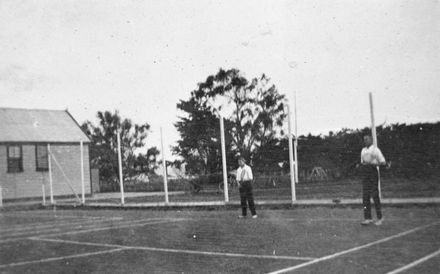 Playing tennis at Longburn School tennis courts