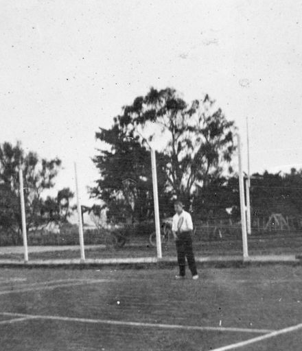Playing tennis at Longburn School tennis courts