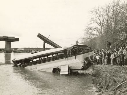 Weld Motors' bus being hauled from Rangitikei River