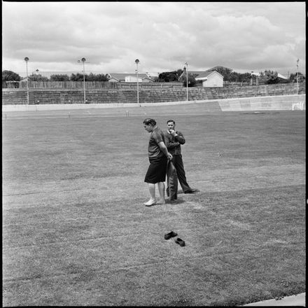 Russian athlete Tamara Press being shown the athletics field at Memorial Park