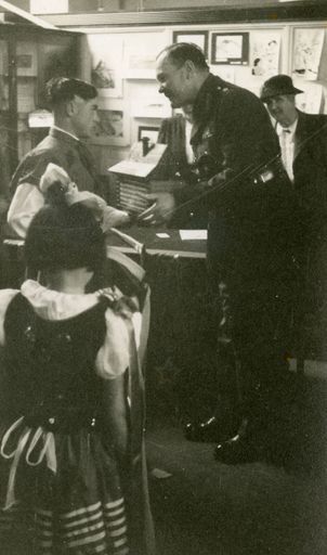 Governor General, Lieutenant-General Sir Bernard Cyril Freyberg, receiving gift from Polish children