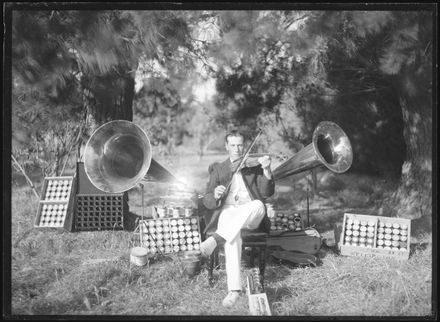 Violinist with Cylinder Phonograph Collection