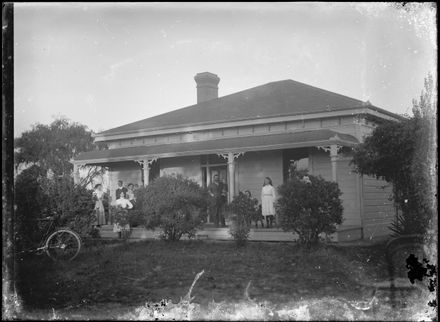 Family Group Outside Cottage
