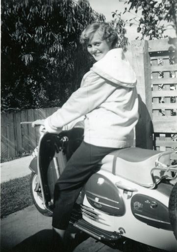 Pamela Burman on her motor scooter, Pahiatua Street