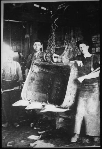 Workers with Steam Shovel Bucket