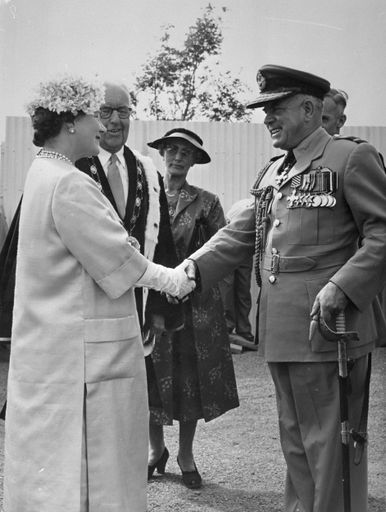 The Queen Mother meeting Group Captain C A Turner